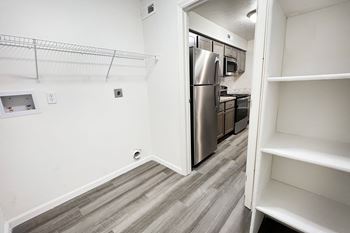 an empty kitchen with a stainless steel refrigerator at Deercross Apartments, Ohio, 45236